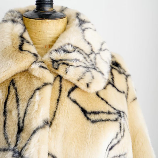 Traci faux fur floral lines